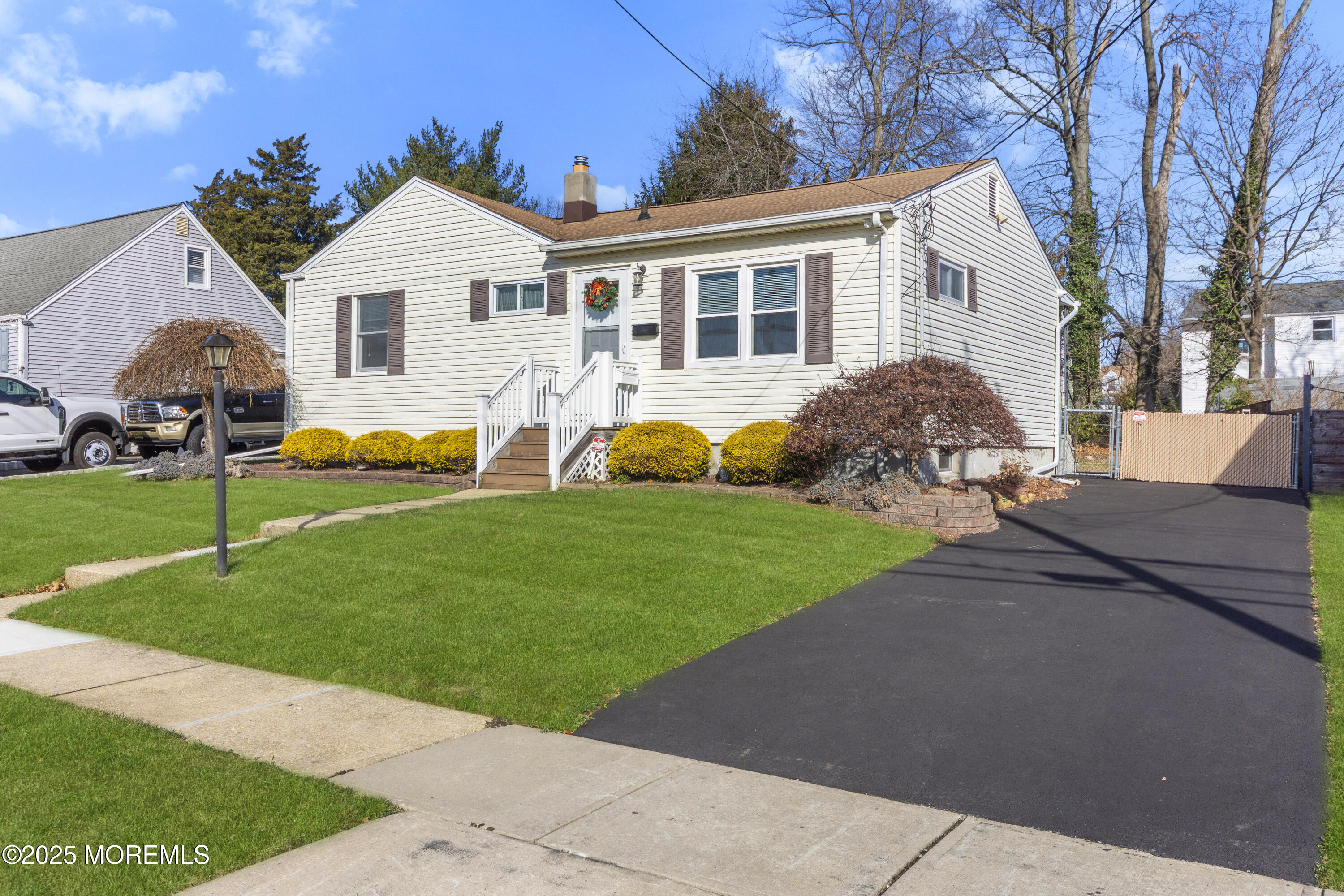 85 Helen Avenue Freehold, NJ 07728 - Photo 2 of 19 a front view of house with yard and green space