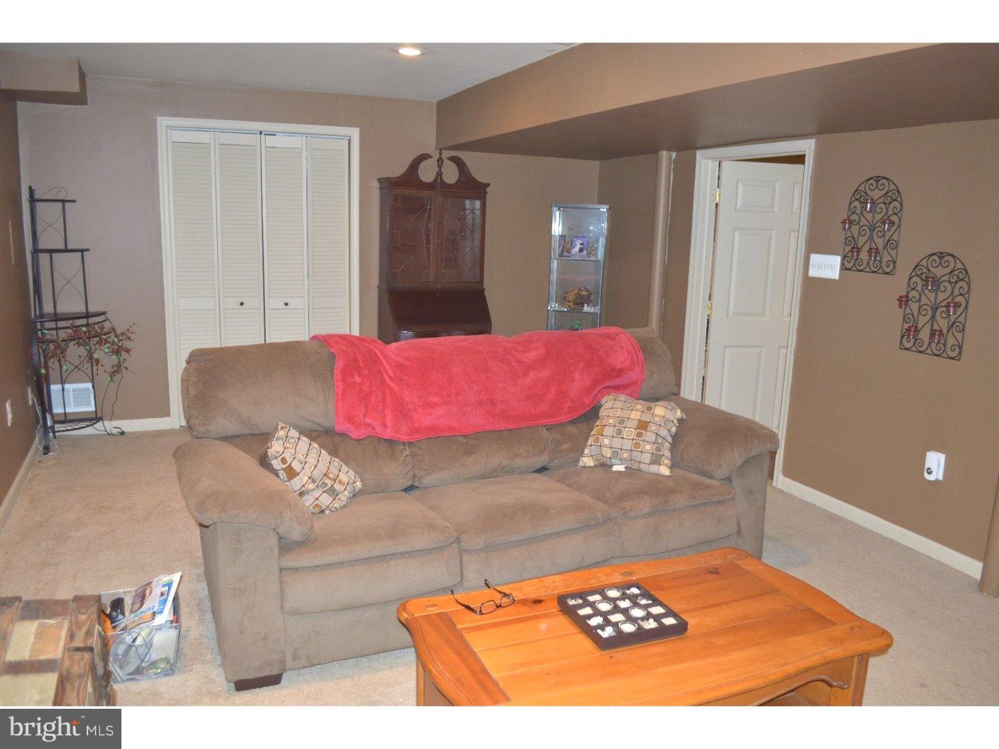 709 Crystle Road Aston, PA 19014 - Photo 12 of 24 a living room with a couch and a couch