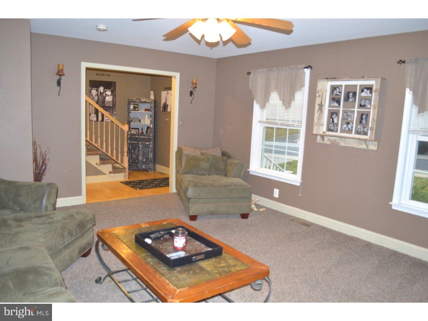 709 Crystle Road Aston, PA 19014 - Photo 3 of 24 a living room with furniture and a window