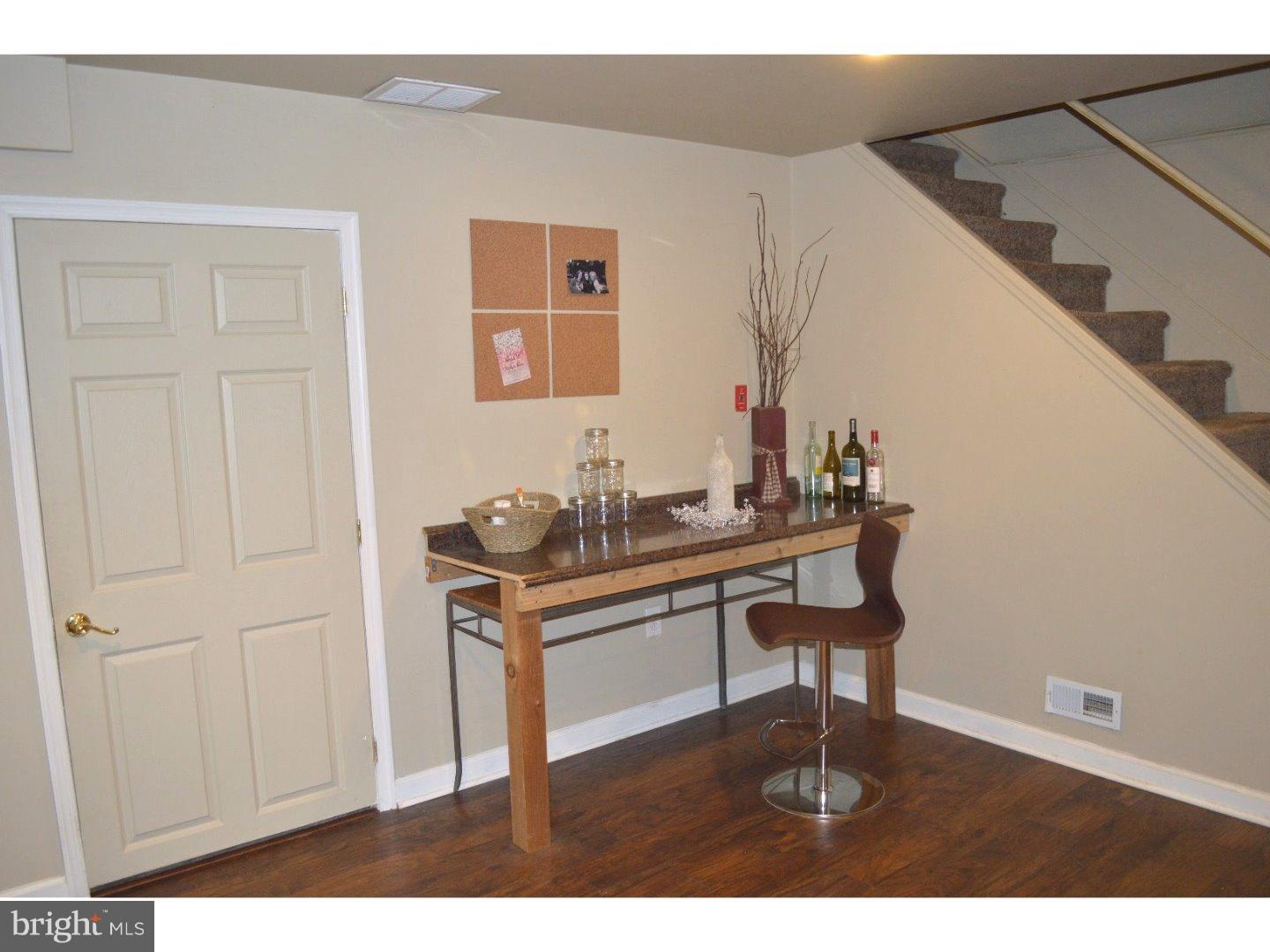 709 Crystle Road Aston, PA 19014 - Photo 10 of 24 a living room with furniture and a table