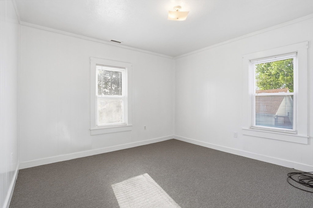 12 Whitcomb Street Webster, MA 01570 - Photo 23 of 40 an empty room with a window