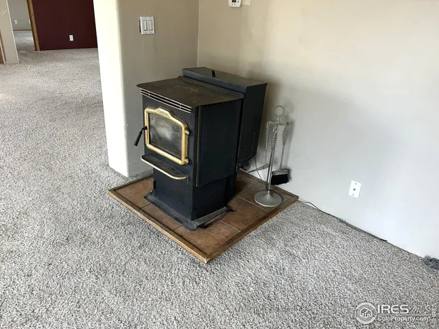 a kitchen with granite countertop a sink and a stove top oven