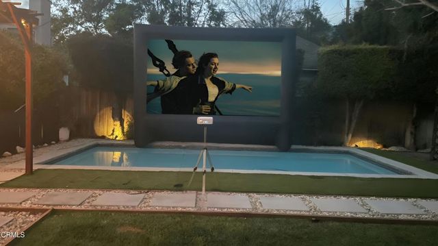 an aerial view of house with yard