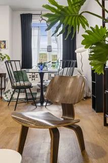 a view of balcony with furniture