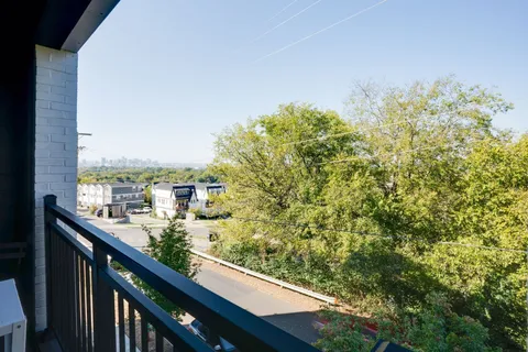 a view of a city from a balcony