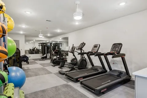 a view of a room with gym equipment