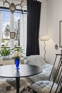 a view of a living room and dining room