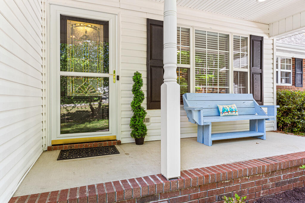 25 Old Hunt Road Pinehurst, NC 28374 - Photo 3 of 47 Covered Porch, glass storm door.