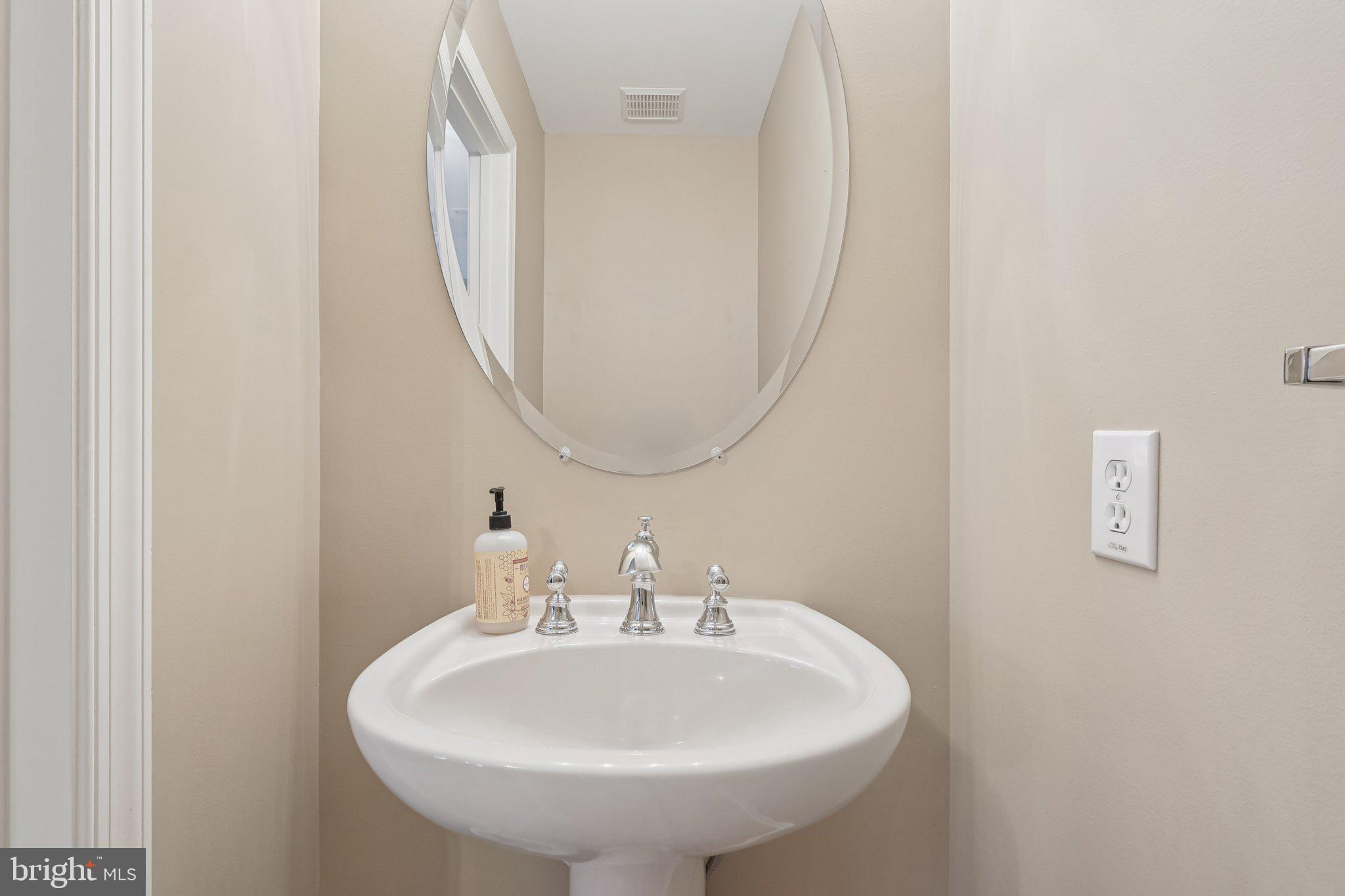 17 Ridgeview Road Delran, NJ 08075 - Photo 16 of 43 a bathroom with a sink and a mirror