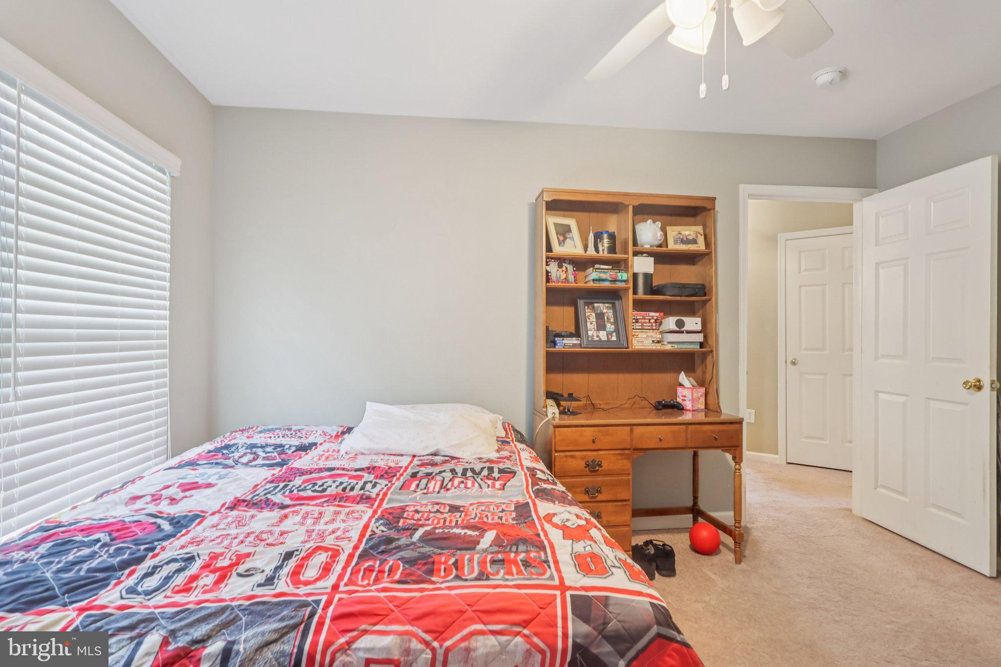 17 Ridgeview Road Delran, NJ 08075 - Photo 29 of 43 a bedroom with a bed and a workspace