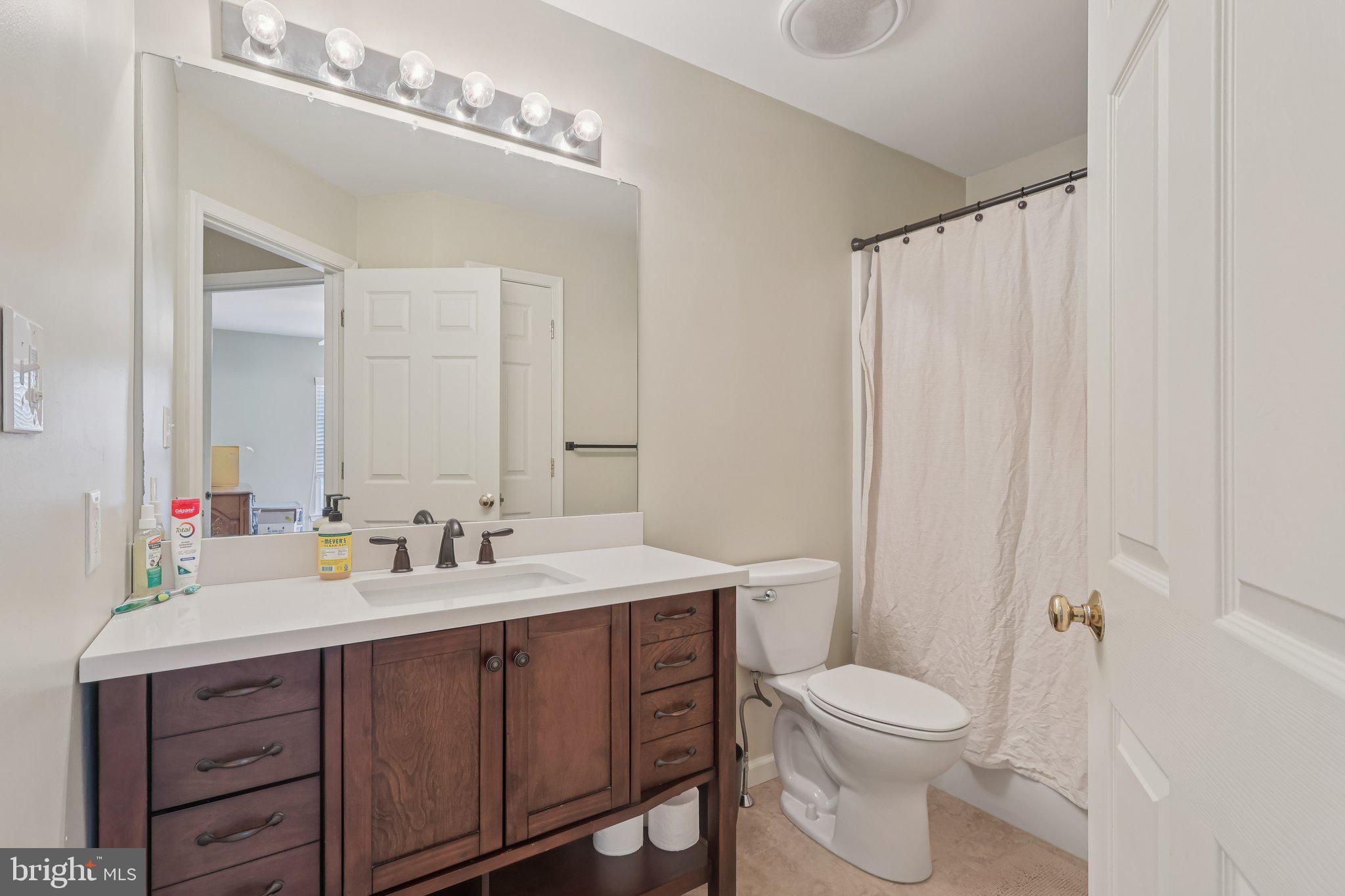 17 Ridgeview Road Delran, NJ 08075 - Photo 30 of 43 a bathroom with a double vanity sink mirror and toilet