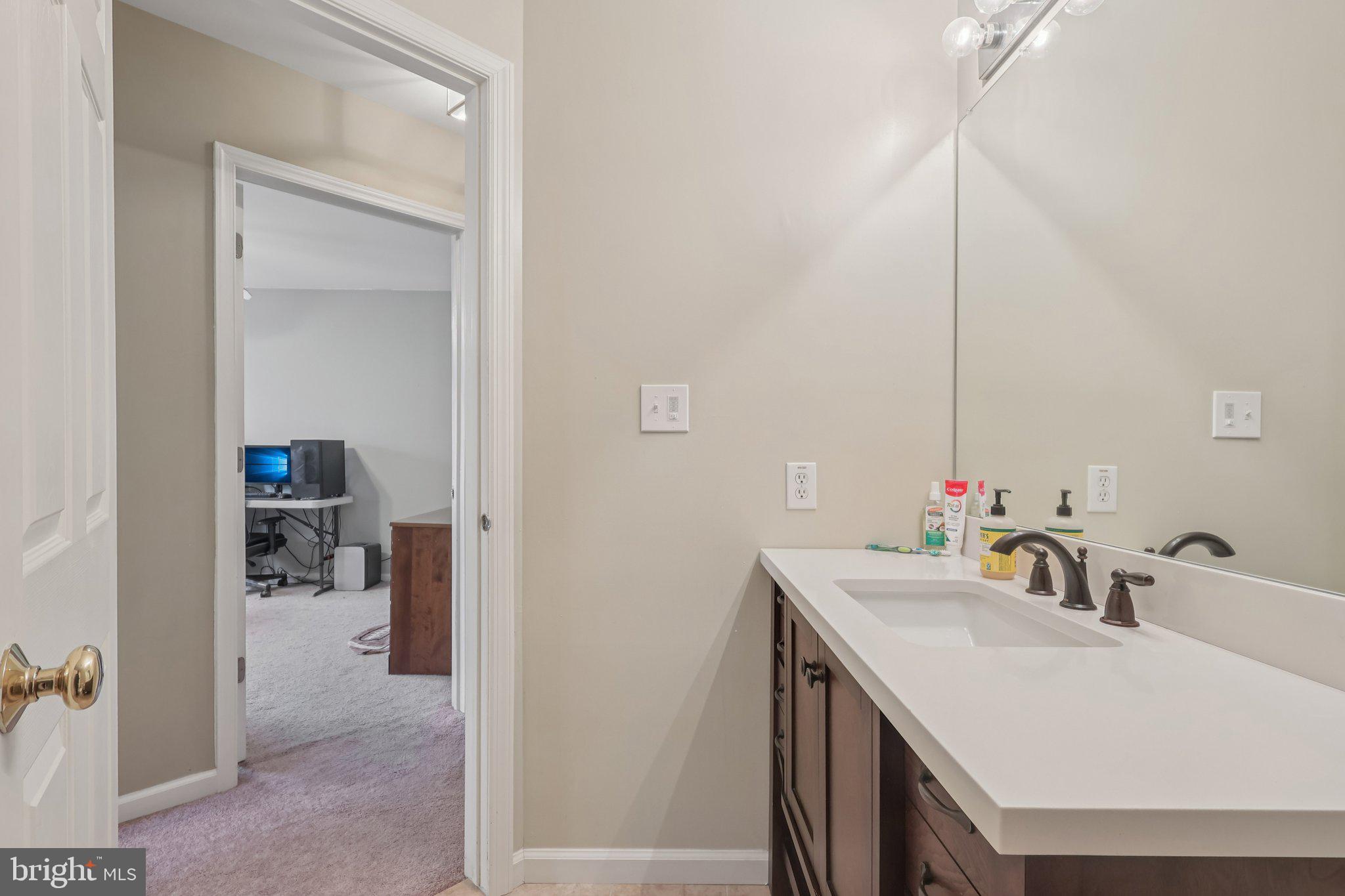 17 Ridgeview Road Delran, NJ 08075 - Photo 31 of 43 a en suite bathroom with a sink and a mirror