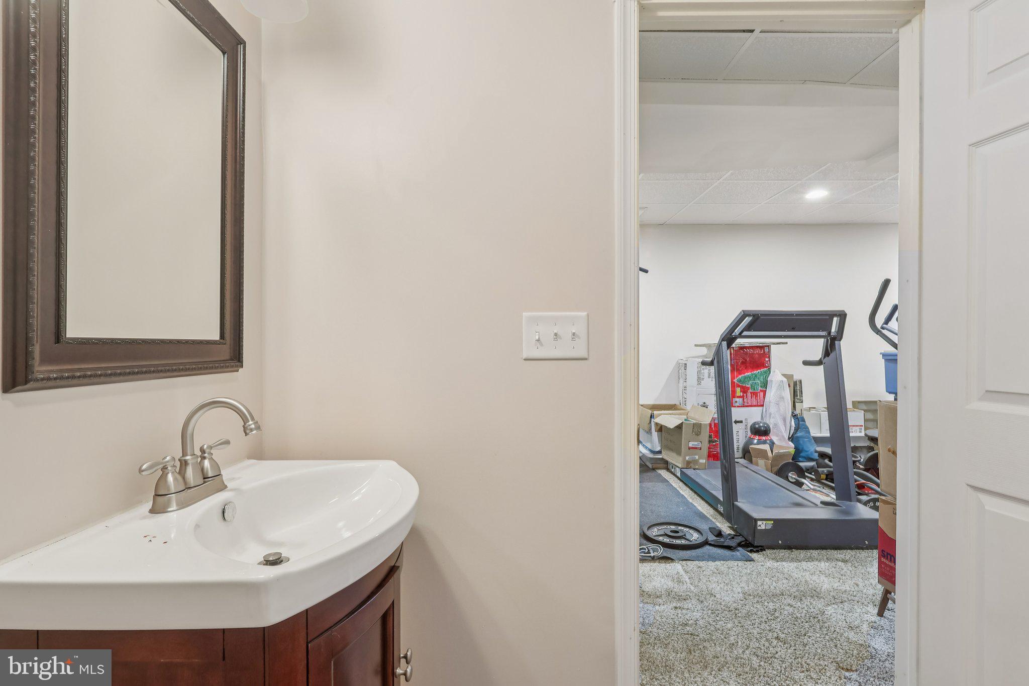 17 Ridgeview Road Delran, NJ 08075 - Photo 35 of 43 a bathroom with a sink and a mirror