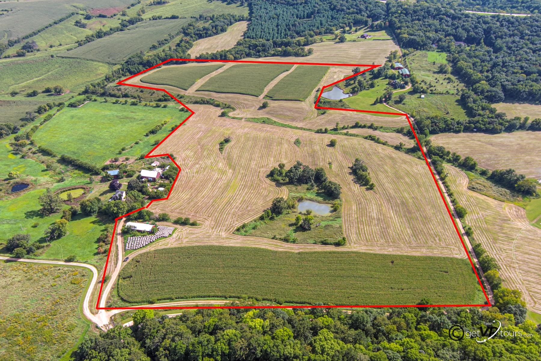 3175 West Mitchell Road Hanover, IL 61041 - Photo 2 of 14 an aerial view of a wooden house