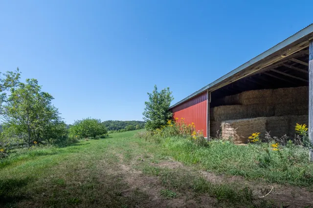 a backyard of a house with lots of green space