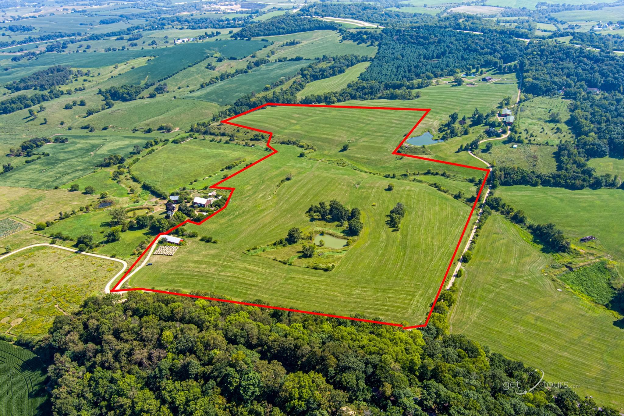 3175 West Mitchell Road Hanover, IL 61041 - Photo 9 of 14 an aerial view of a golf course with parking space