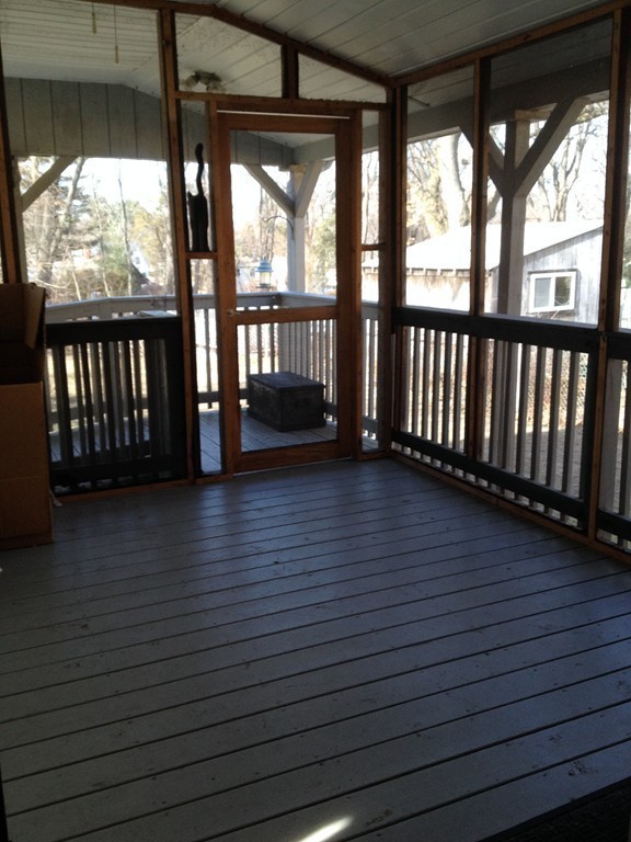 64 Roy Street Springfield, MA 01104 - Photo 23 of 29 a view of a porch with wooden floor