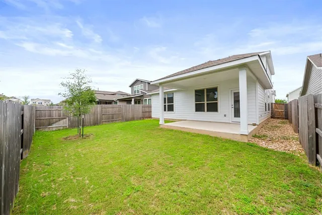 a house view with a garden space