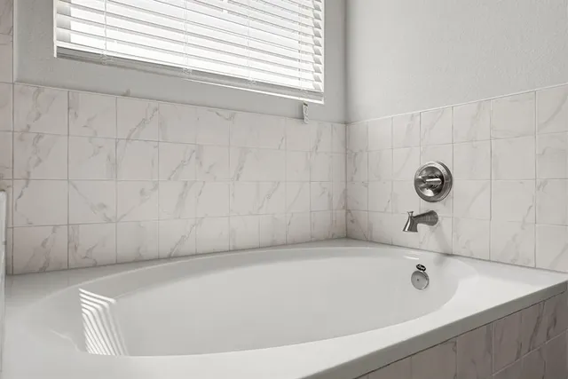 a bathroom with a bathtub