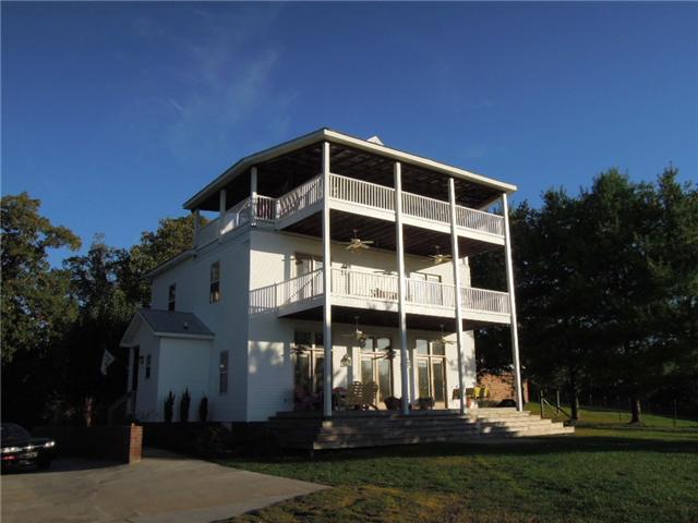 5923 Pettus Road Antioch, TN 37013 - Photo 1 of 20 The back of this house is the showplace. What a place to entertain! What a place to live! You feel like you're at a resort! Check out the tour at www.tnrealestatephoto.com/5923-pettus-rd-karen-neal/