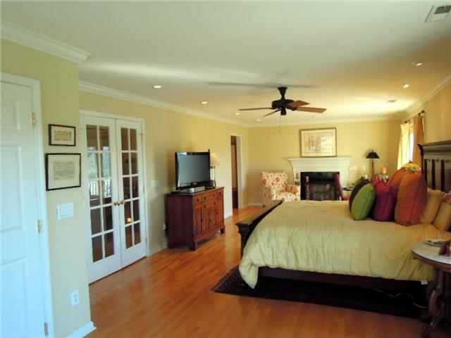 5923 Pettus Road Antioch, TN 37013 - Photo 11 of 20 33x14 master suite stretches across the back of the house with a private deck to watch the sun set. Fireplace and double closet plus bathroom suite.