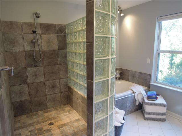 5923 Pettus Road Antioch, TN 37013 - Photo 13 of 20 Huge walk-in tile shower with glass block wall...no door needed. Whirlpool tub.