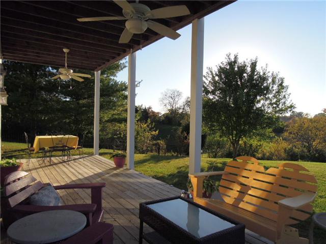 5923 Pettus Road Antioch, TN 37013 - Photo 17 of 20 Lower deck with wide steps to ground. Ceiling fans on all decks.Sidewalk around to kitchen door. Gorgeous sunsets all year round.