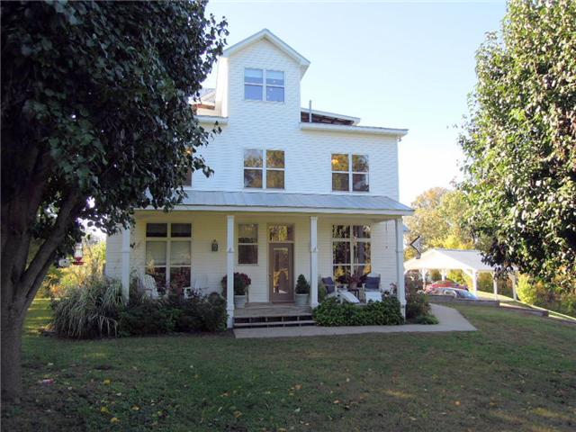 5923 Pettus Road Antioch, TN 37013 - Photo 3 of 20 Unique three story beauty sitting pretty on a hill. Charming farmhouse appeal with comtemporary design. New white railings. Tin roof. Mature landscaping.