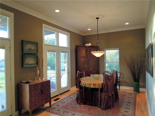 5923 Pettus Road Antioch, TN 37013 - Photo 8 of 20 Formal dining with prairie style light fixture. Custom Benjamin Moore coordinating paint scheme. Doors to deck.