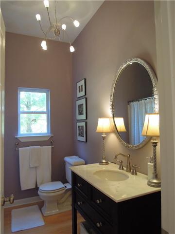 5923 Pettus Road Antioch, TN 37013 - Photo 10 of 20 Powder room downstairs has a shower hidden in the corner. Hall closet under staircase.