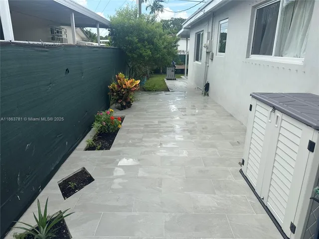 a garden view with a seating space