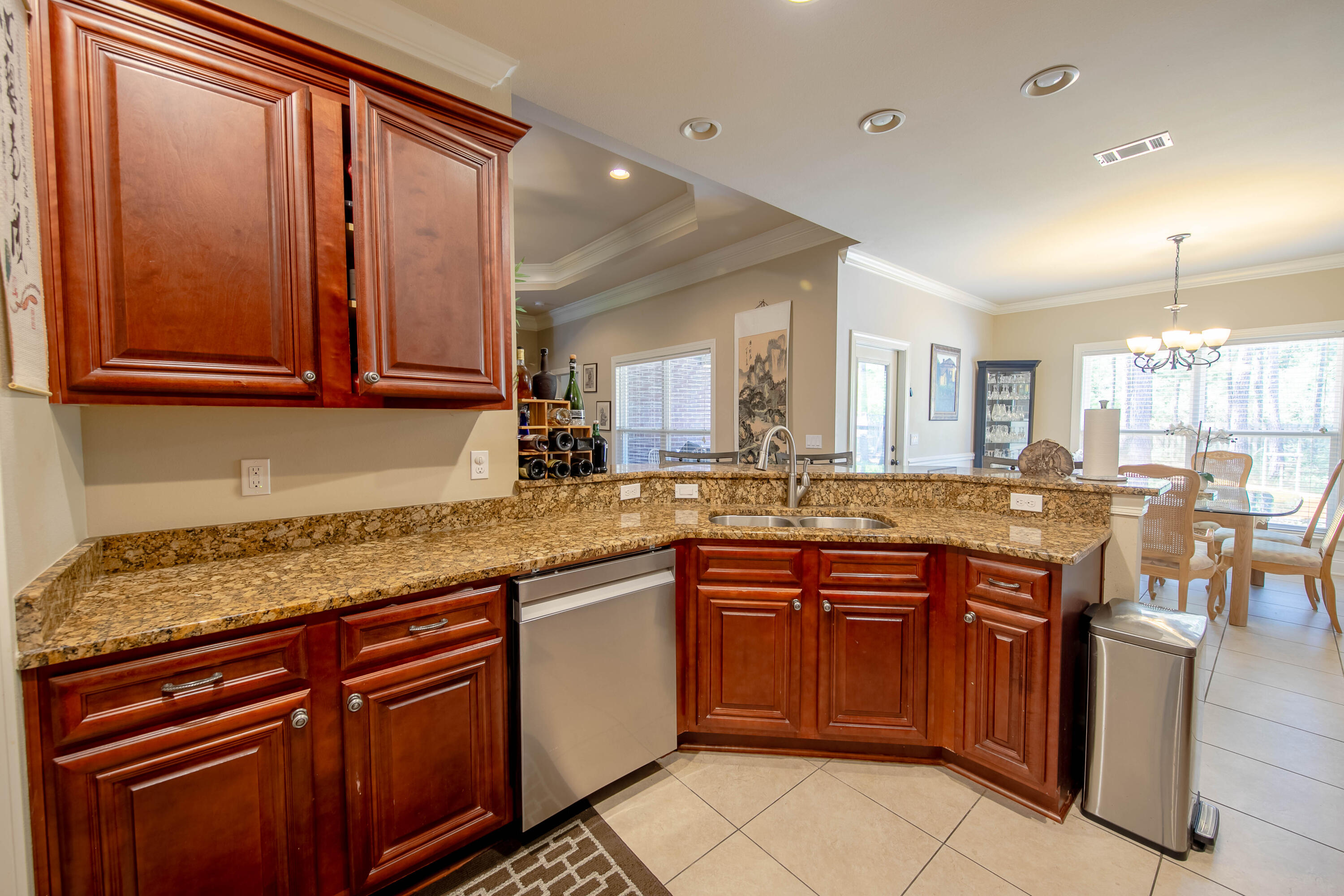 456 Windchime Way Freeport, FL 32439 - Photo 13 of 34 a kitchen with a sink and cabinets