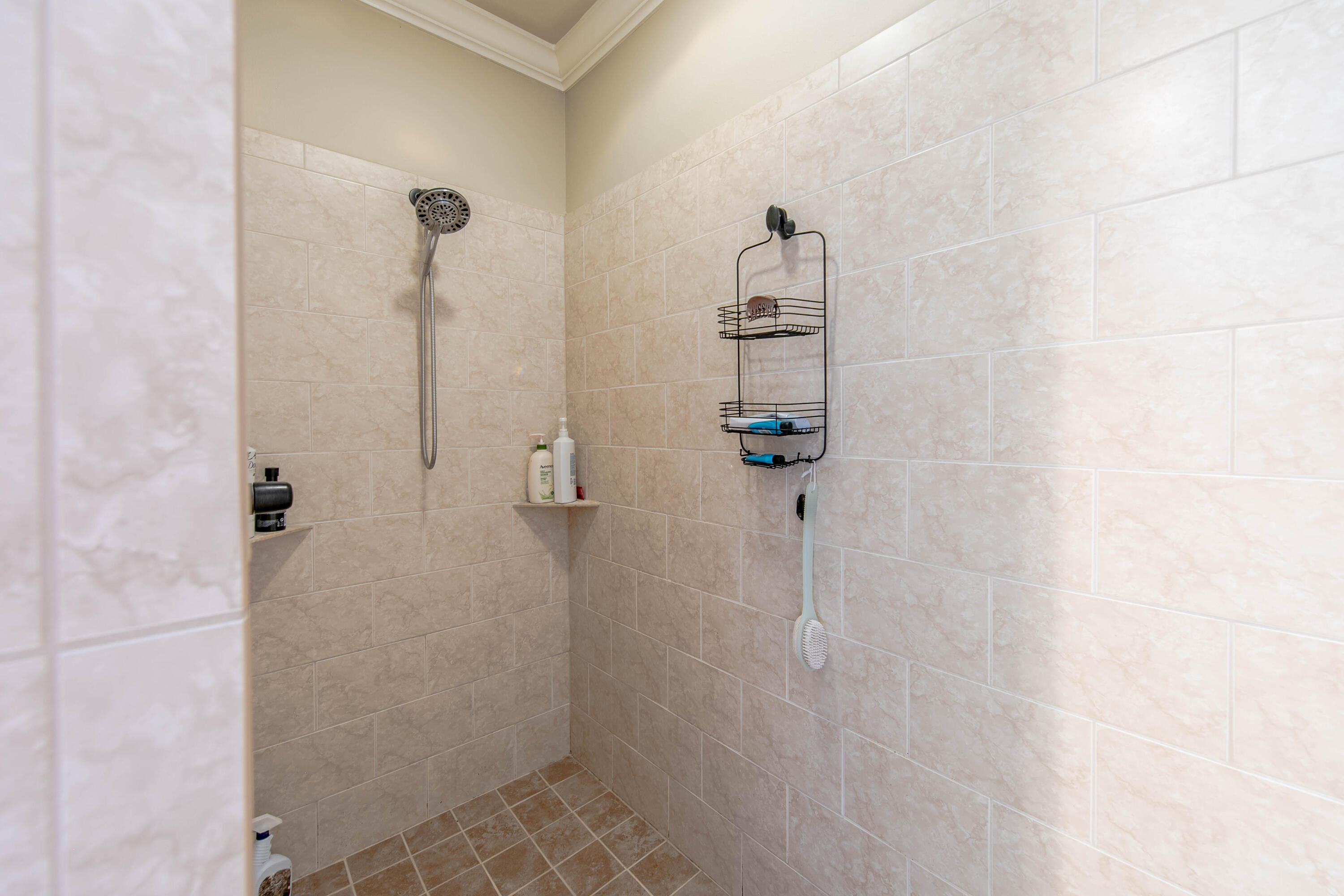 456 Windchime Way Freeport, FL 32439 - Photo 22 of 34 a bathroom with a shower