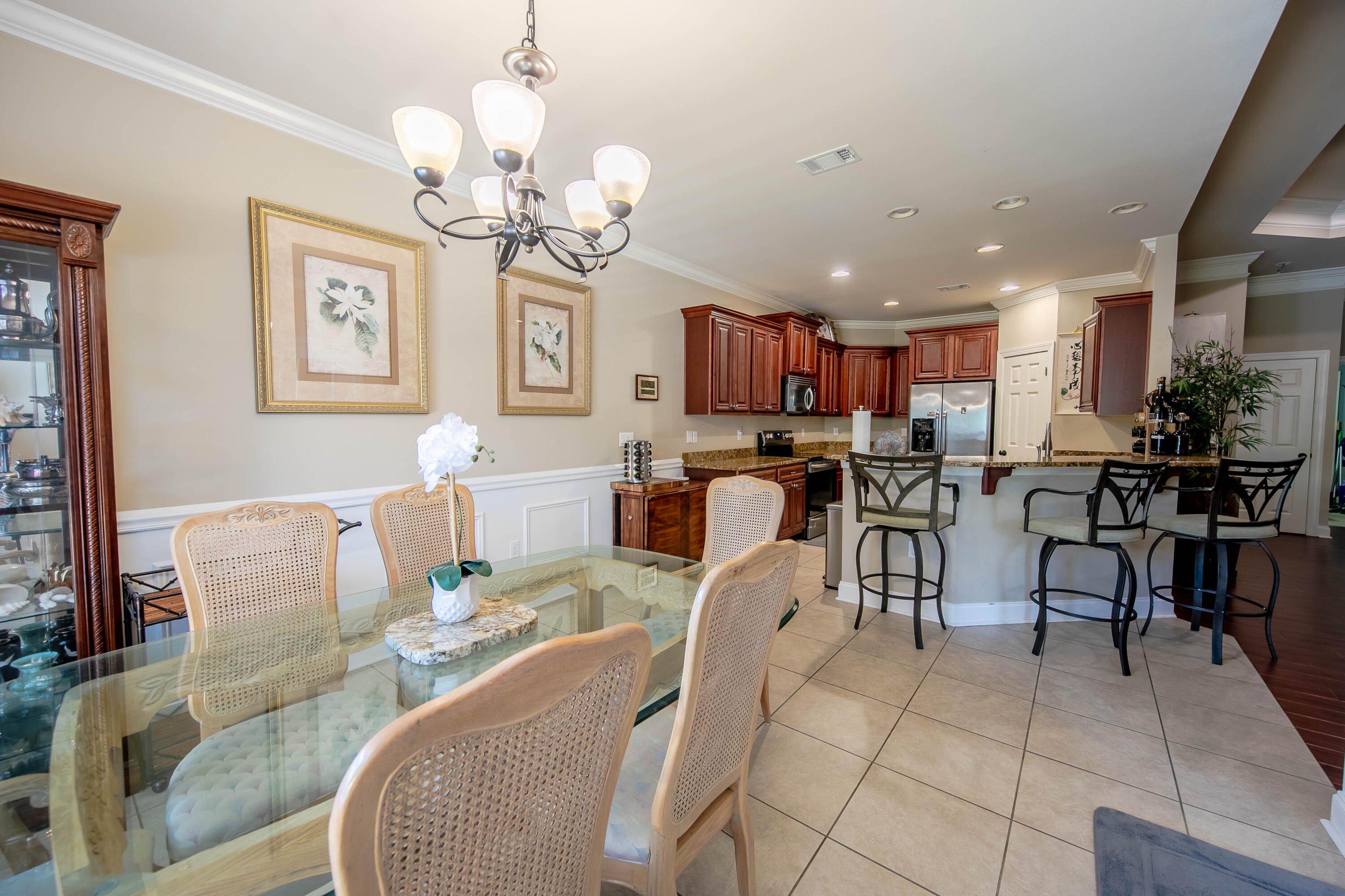 456 Windchime Way Freeport, FL 32439 - Photo 9 of 34 a view of a dining room with furniture