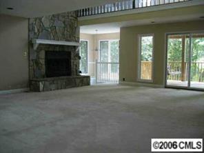 31012 Executive Point Tega Cay, SC 29708 - Photo 3 of 8 a living room with a fireplace