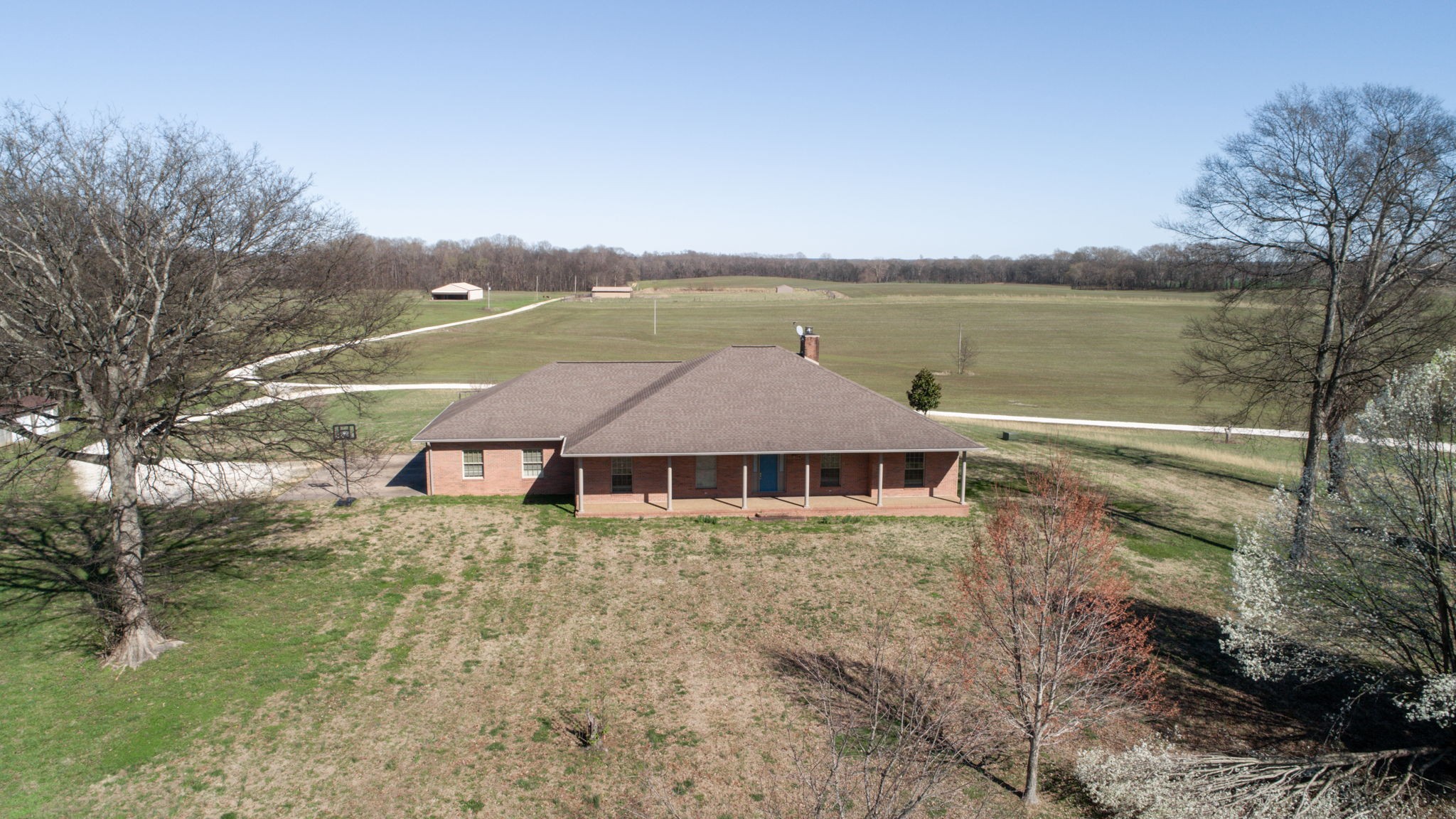 a aerial view of a house with a lake view