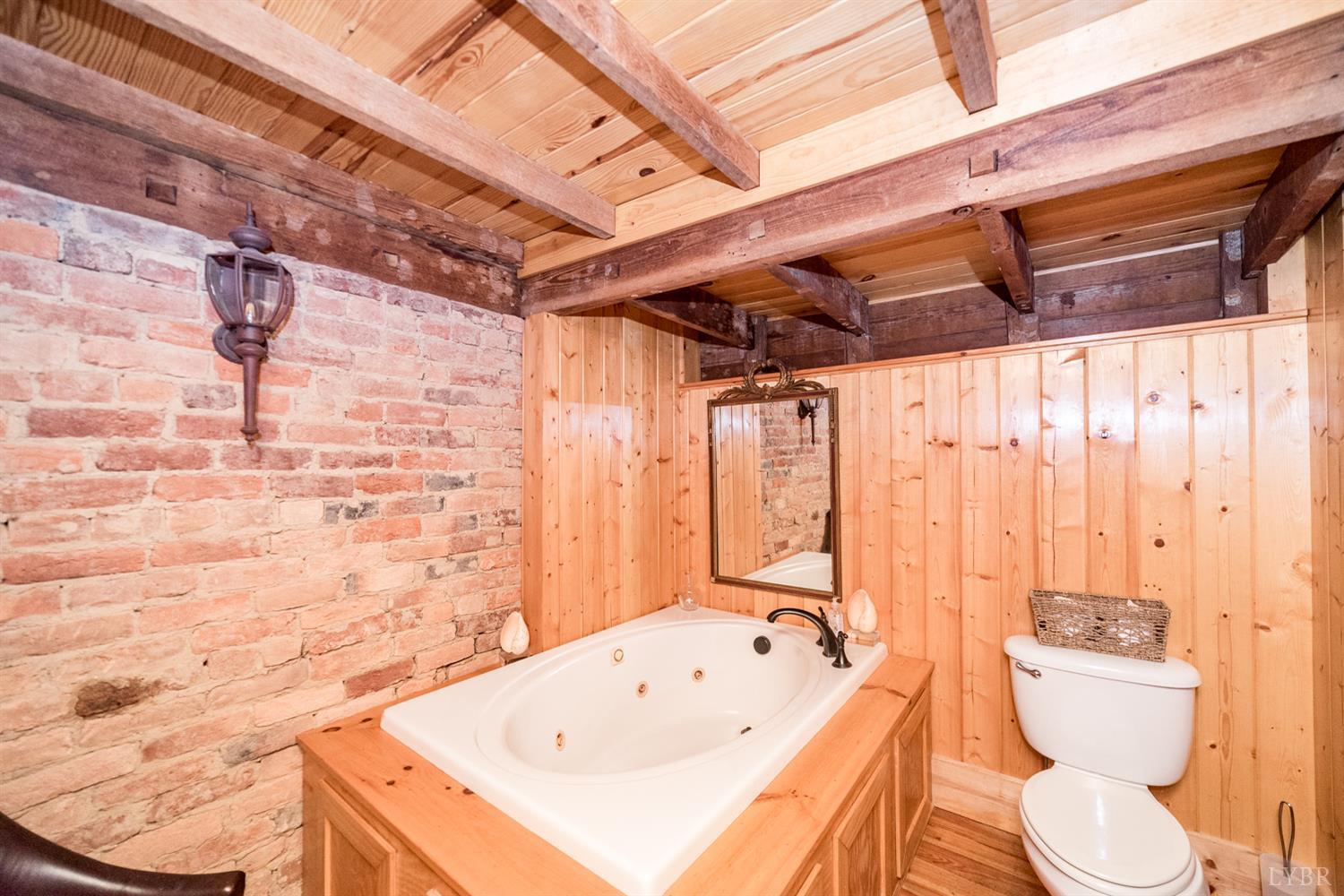 2416 Lowesville Road Amherst, VA 24521 - Photo 2 of 98 a bathroom with a sink a toilet and shower