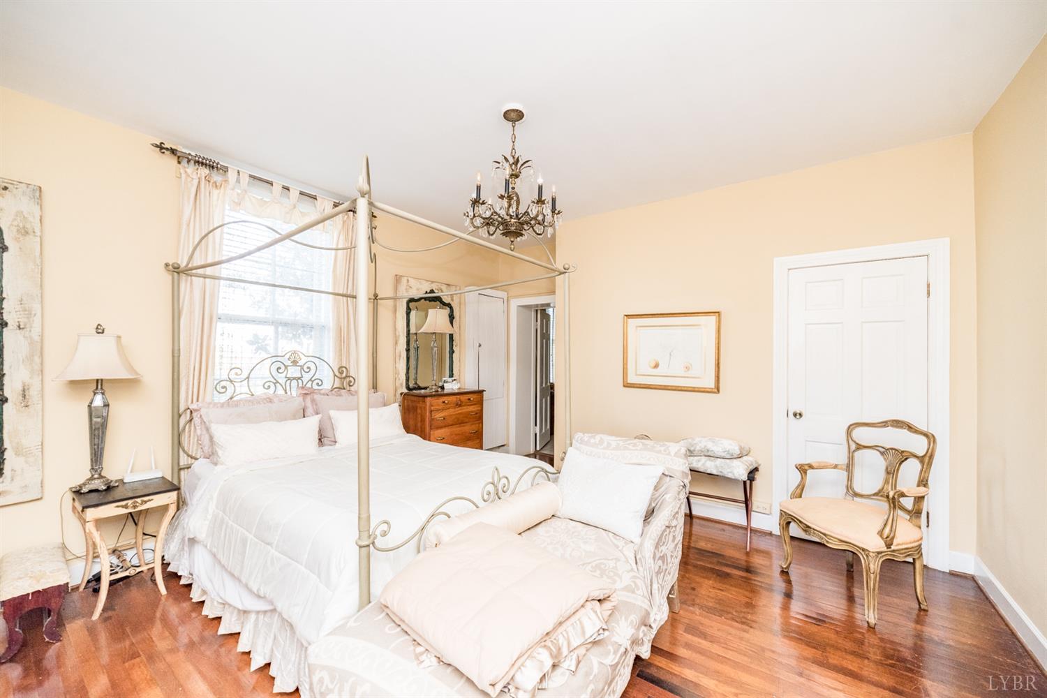2416 Lowesville Road Amherst, VA 24521 - Photo 60 of 98 a living room with furniture and a chandelier