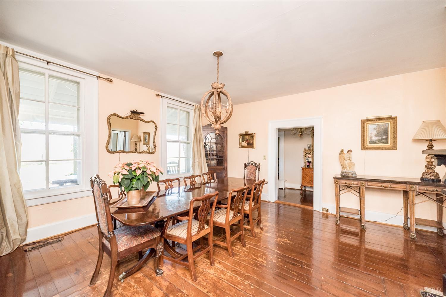 2416 Lowesville Road Amherst, VA 24521 - Photo 65 of 98 a view of a dining room with furniture window and wooden floor