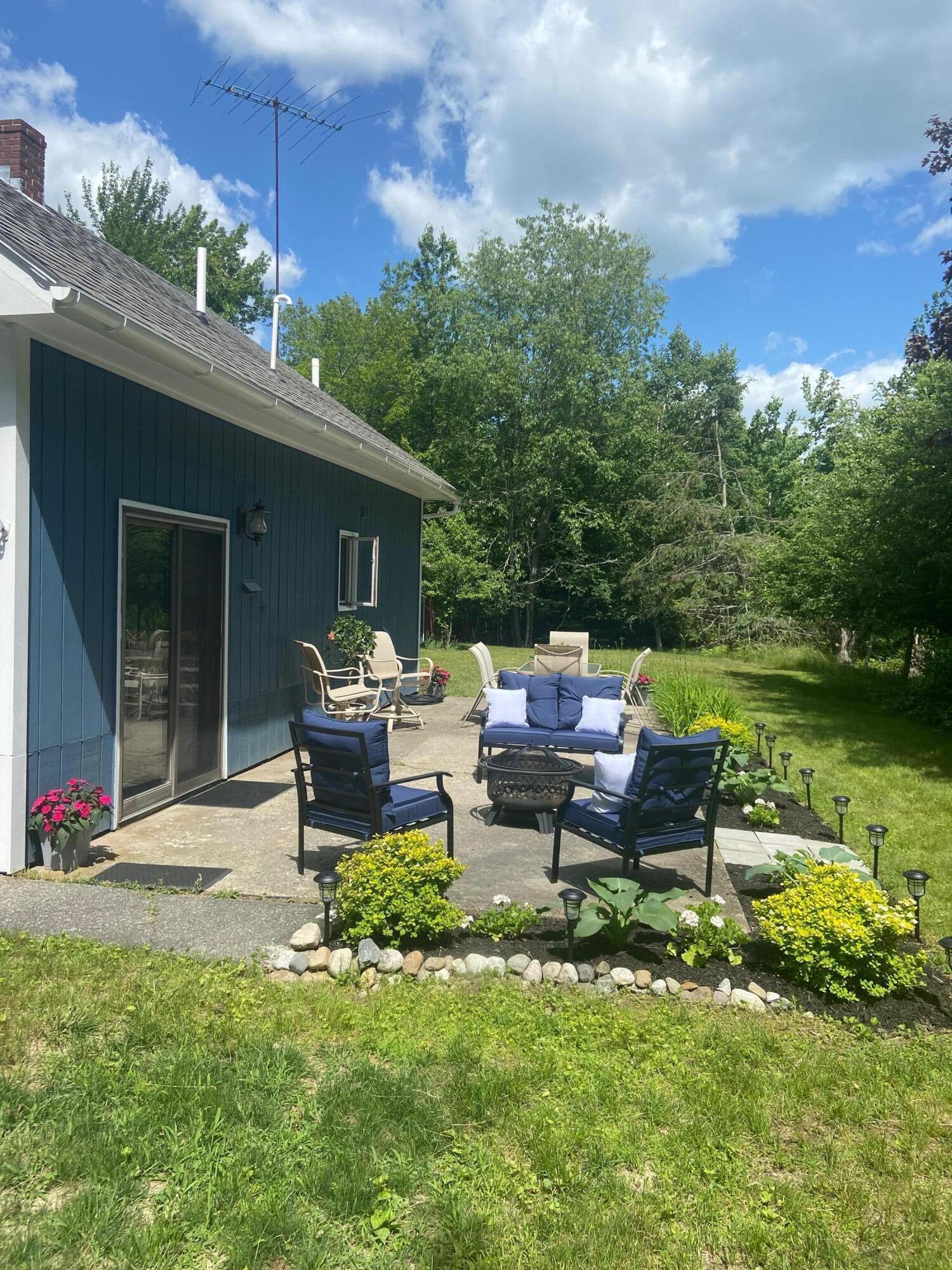 502 Newbury Neck Road Surry, ME 04684 - Photo 10 of 40 Patio and side yard
