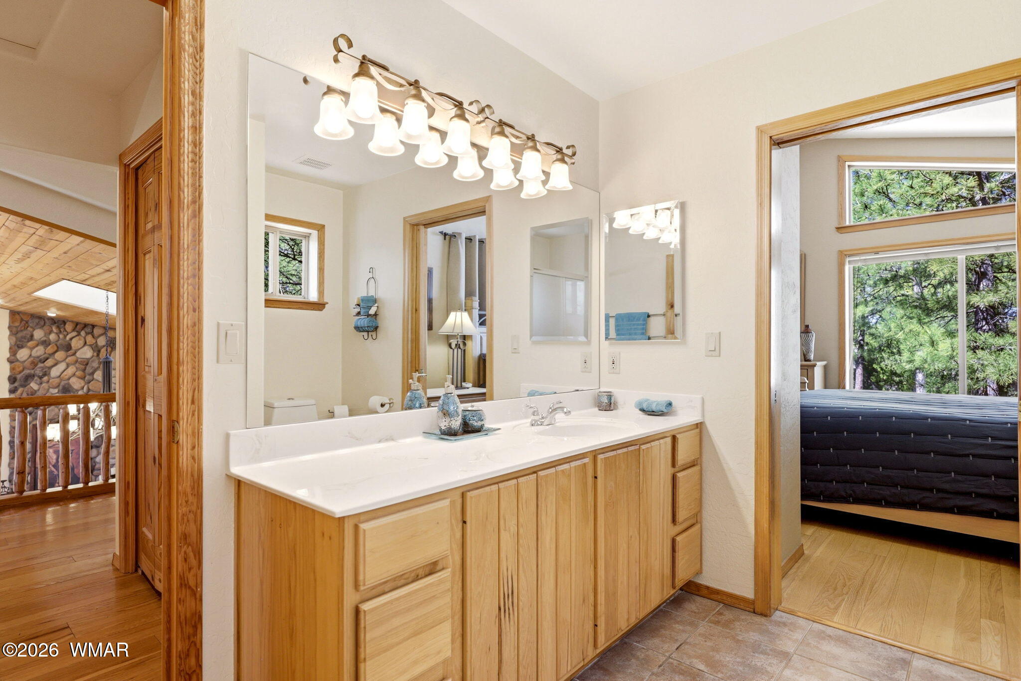 826 Pine Creek Circle Lakeside, AZ 85929 - Photo 20 of 65 a bathroom with a sink a vanity and a mirror