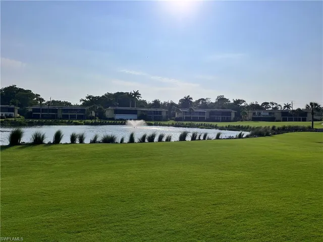 a view of a lake with a big yard