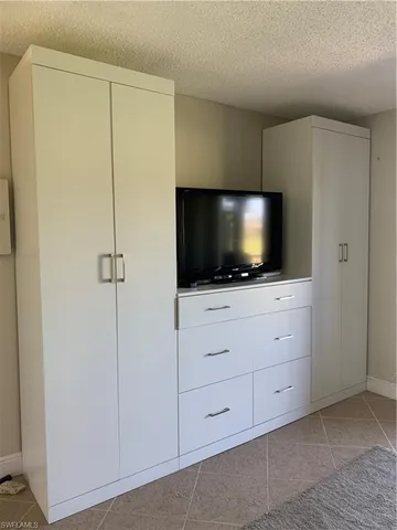 a room with flat screen tv