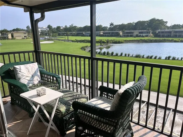a view of a chairs and table on the deck