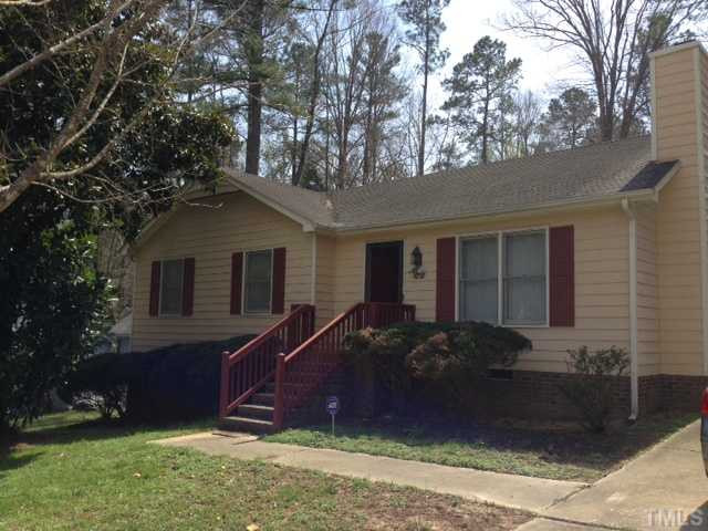 4220 Labrador Drive Raleigh, NC 27616 - Photo 1 of 15 a front view of a house with a yard