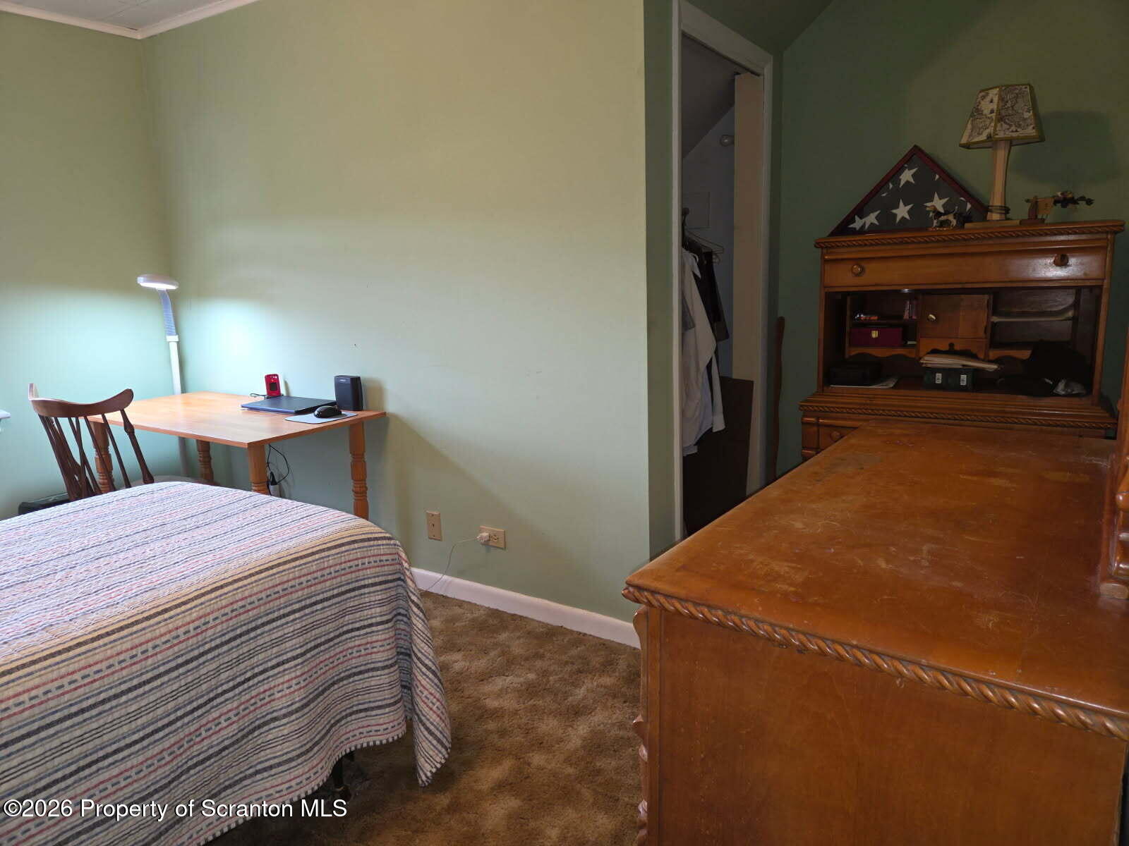 229 East Mountain Road Scranton, PA 18505 - Photo 29 of 47 a bed room with a bed and a fireplace