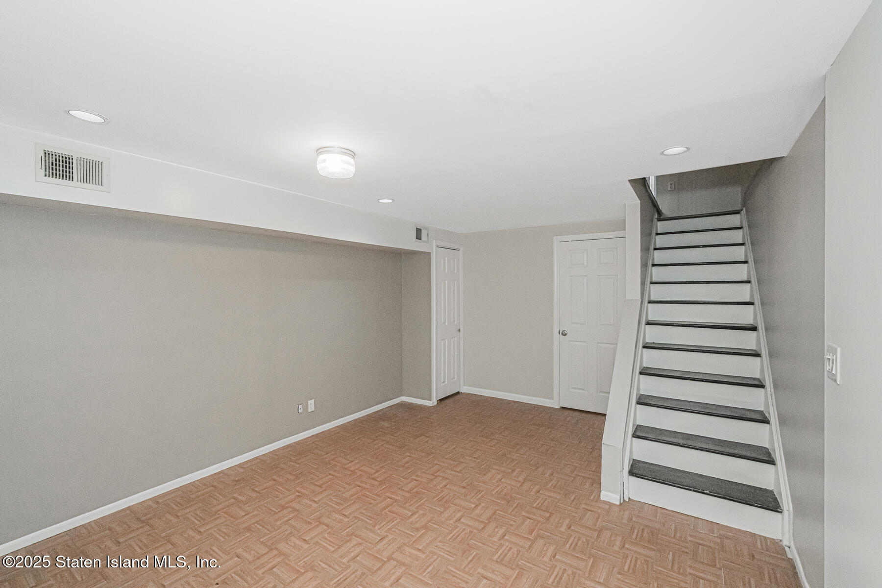 34 Lorraine Loop Staten Island, NY 10309 - Photo 23 of 33 a view of an empty room with a window