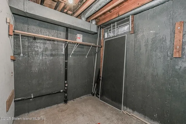 a bathroom with a glass door shower