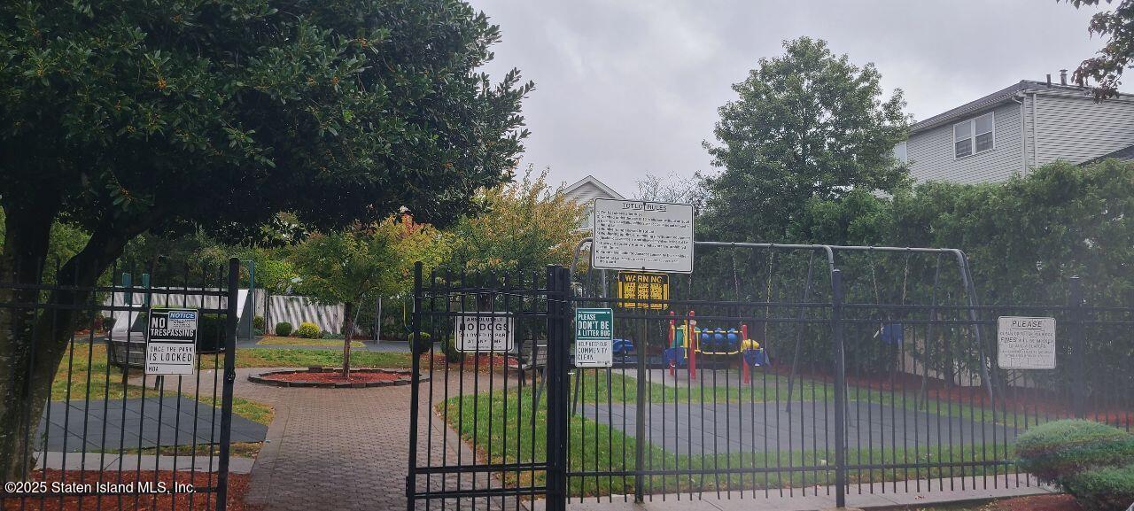 34 Lorraine Loop Staten Island, NY 10309 - Photo 31 of 33 a view of a house with a street