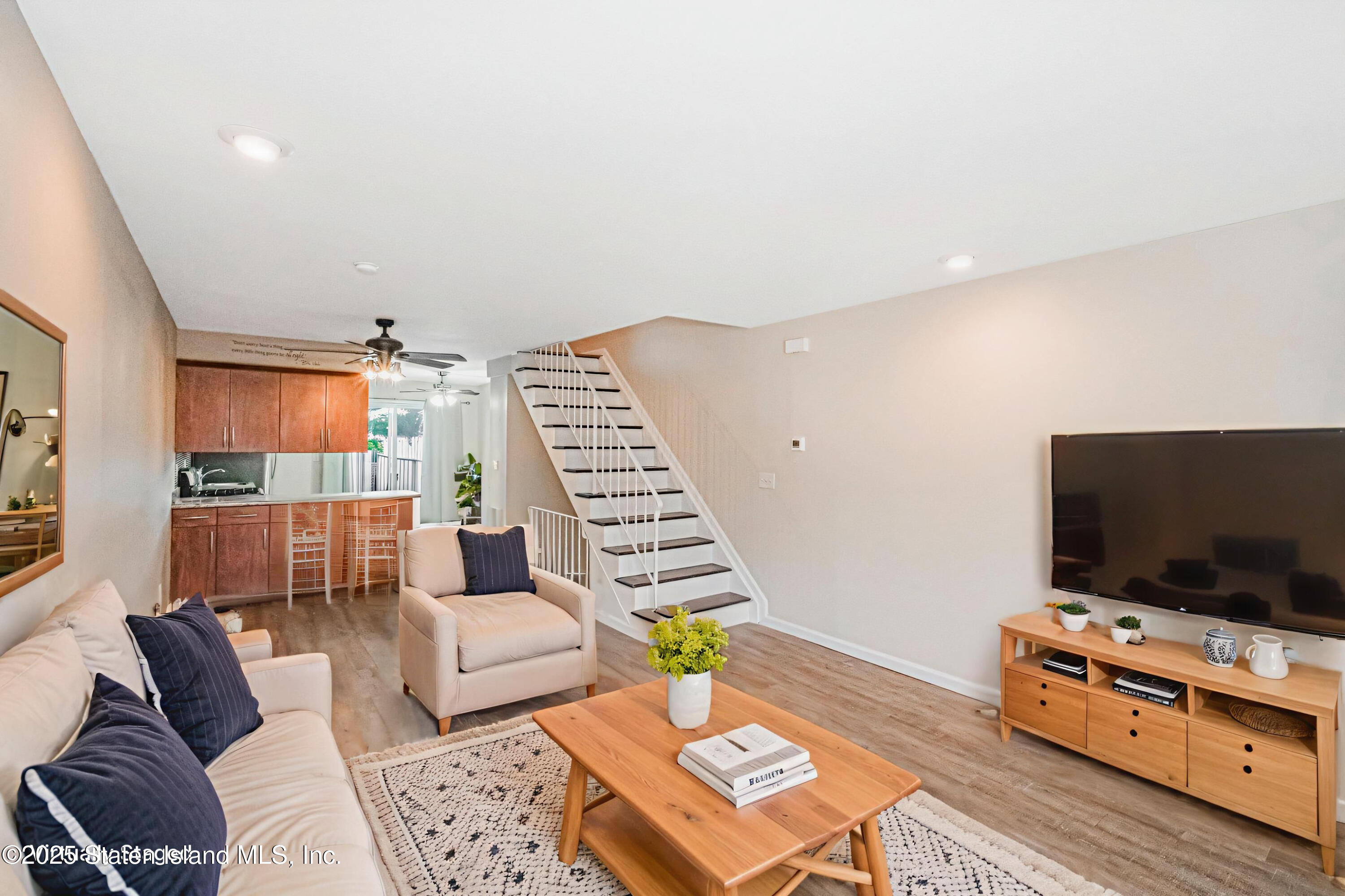 34 Lorraine Loop Staten Island, NY 10309 - Photo 5 of 33 a living room with furniture and a flat screen tv